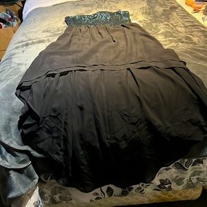 Large, Hi-Low, Torquise and black prom dress with tag. Never worn.